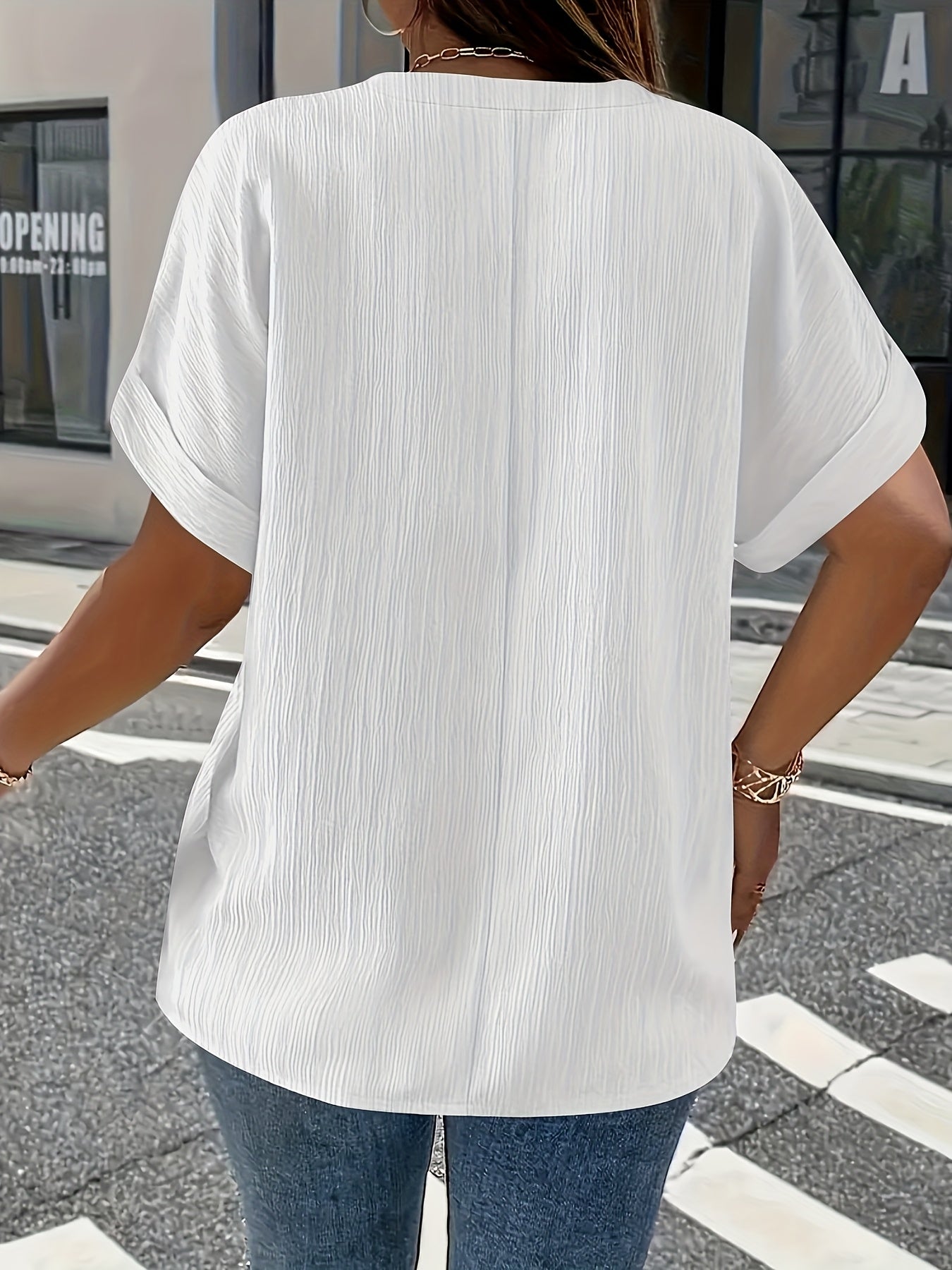 Noiréa – Textured V-Neck Comfort Blouse